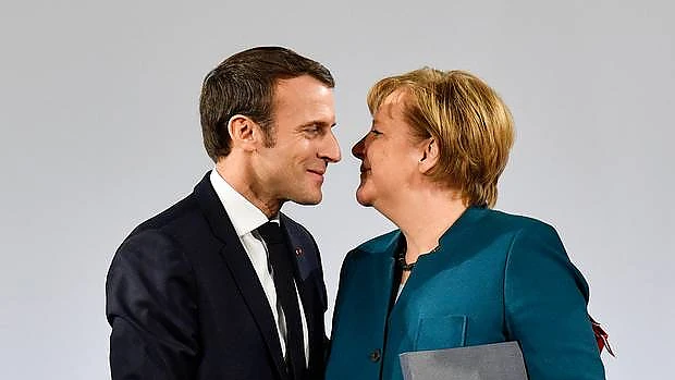 Jurnalist Bloomberg: Europa va deveni Ã®n doi ani un Show Horror. RelaÈia TOXICÄ Macron-Merkel riscÄ sÄ se destrame!